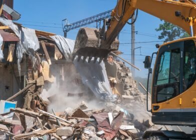 bigstock-Process-Of-Demolition-Of-Old-B-425781413-scaled